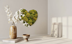 Lush moss in a heart-shaped wine barrel metal frame, wall art for interior decor.