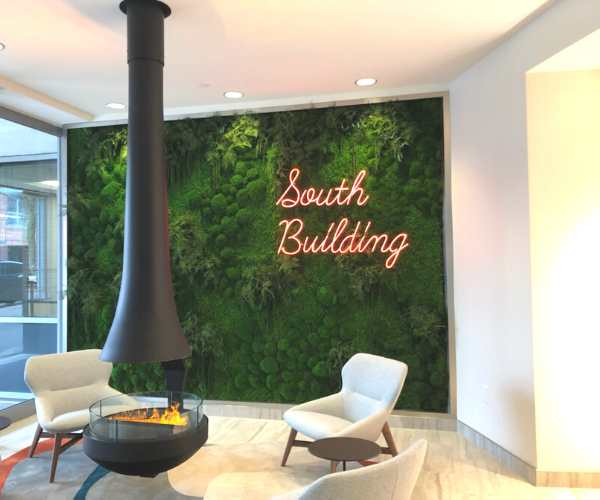 lobby with moss wall art