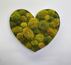 Lush moss wine barrel heart-shaped metal frame, rustic wall art.