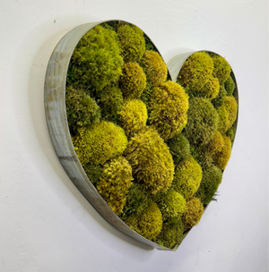 Lush moss heart-shaped wine barrel frame with distressed metal, 22-25 inches, rustic wall art.