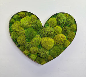 Heart-shaped lush moss wall art in distressed wine barrel metal frame.